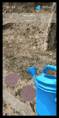 Watering a virtual plant with an augmented reality watering can