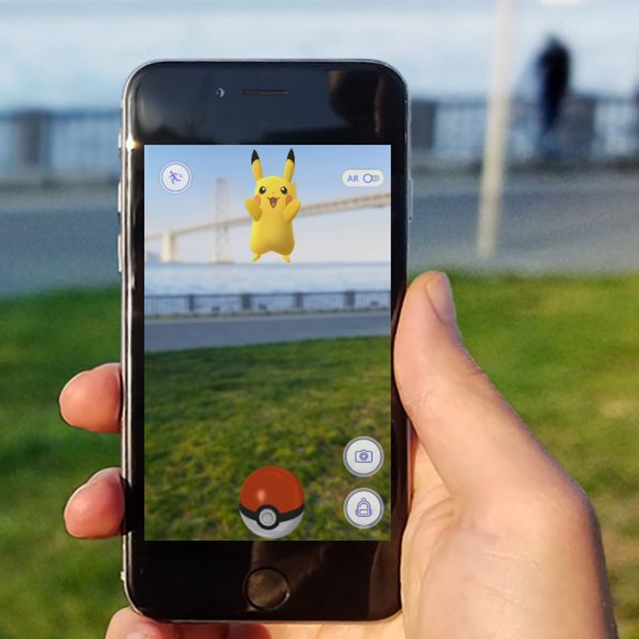 Augmented reality game characters in a real environment
